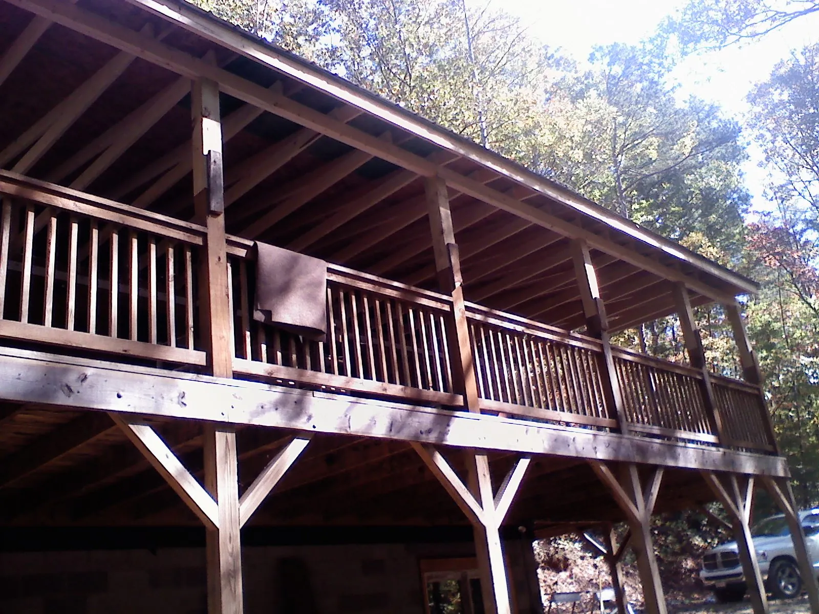 Timber framing under a new elevated porch and deck — Roof Leak Repair in Sasser by Roofing Brothers